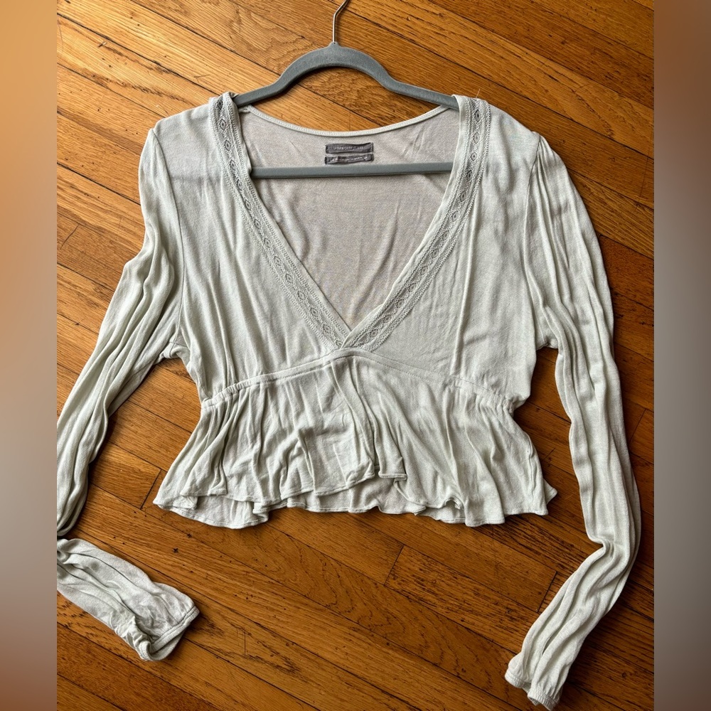 Urban outfitters cropped deep v neck long sleeve shirt. Size Large.